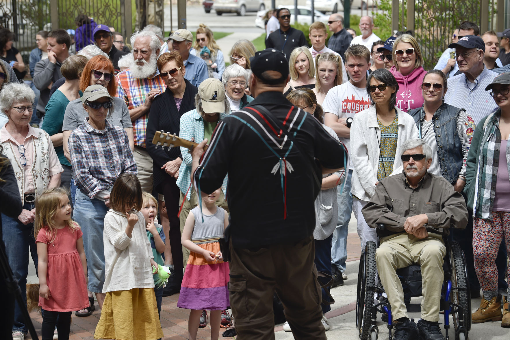 Jack Gladstone plays music for supporters